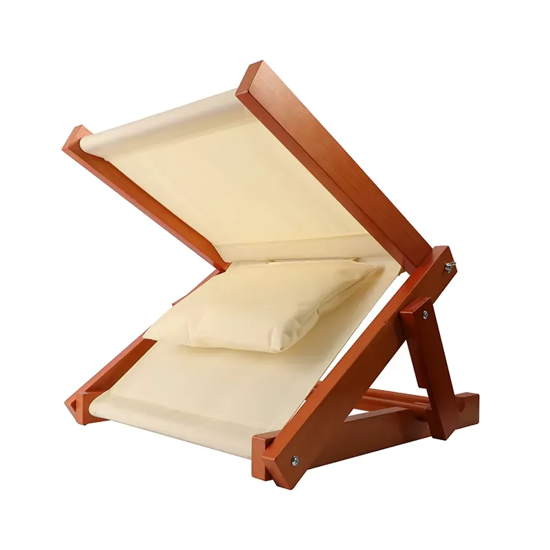 Wooden folding beach lounger in reclined position with head cushion
