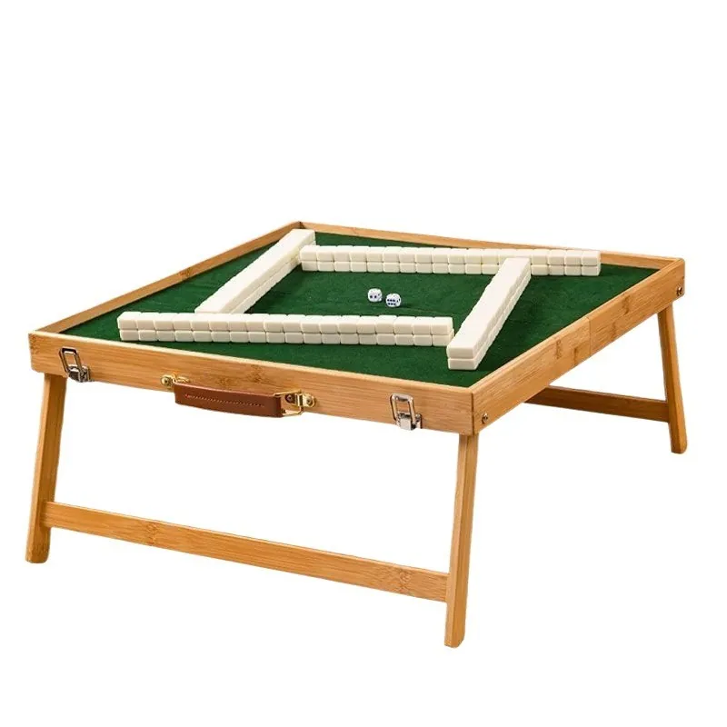 Foldable bamboo game table with green felt top and mahjong tiles