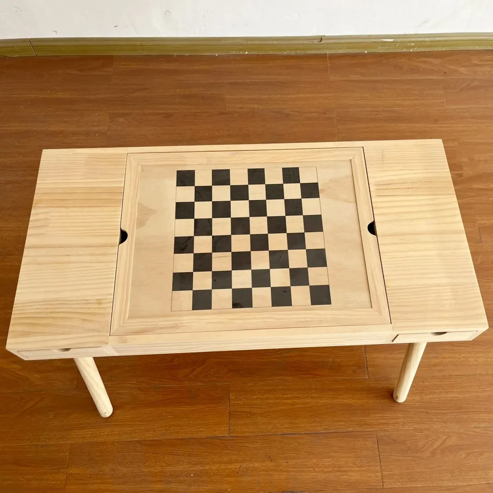 Natural pine wooden game table with inlaid chessboard top and side drawer, front view