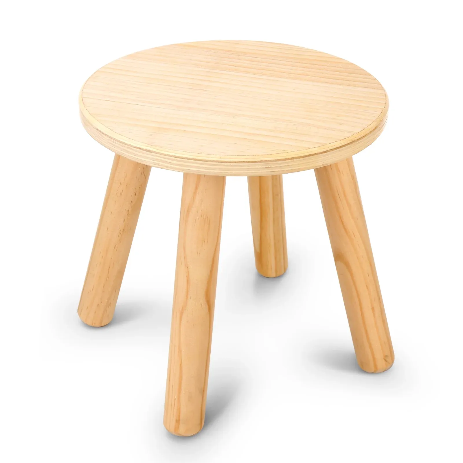 Small round wooden stool with four turned legs on white background