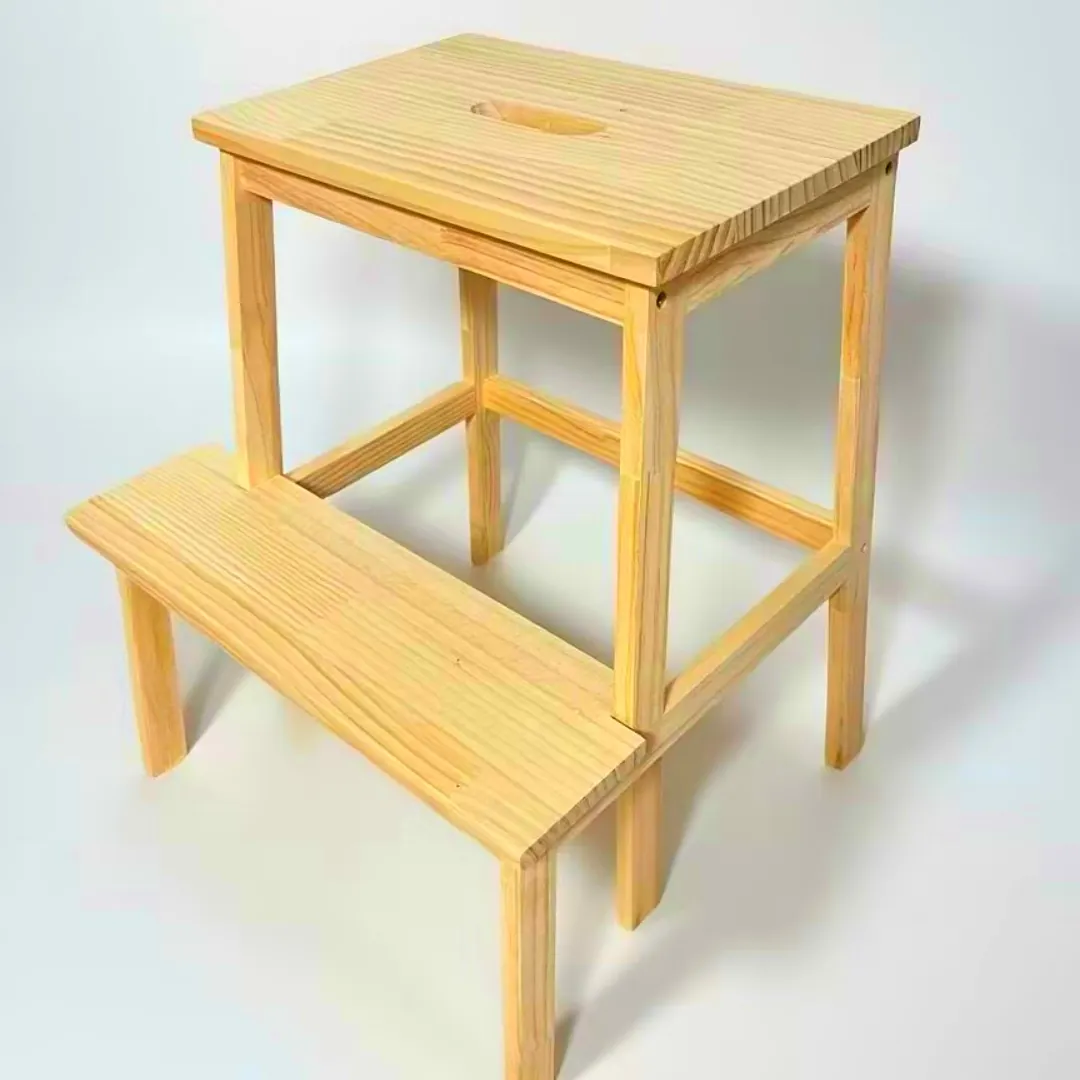 Two-step natural pine wooden step stool with hand-hold cut-out on white background