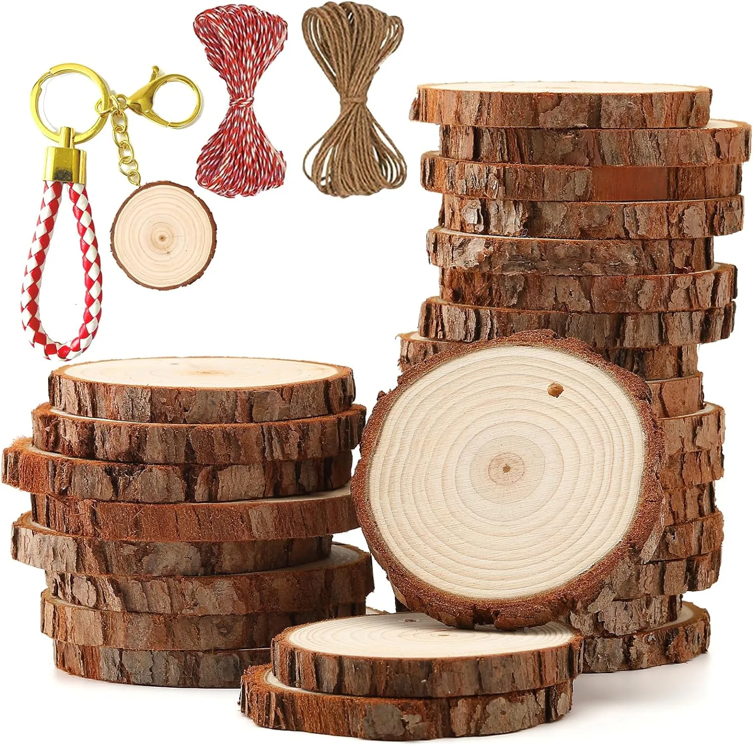 Stack of natural wood slices with bark edges, twine and key rings